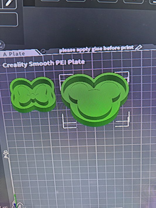 mick/min with bow badge reel